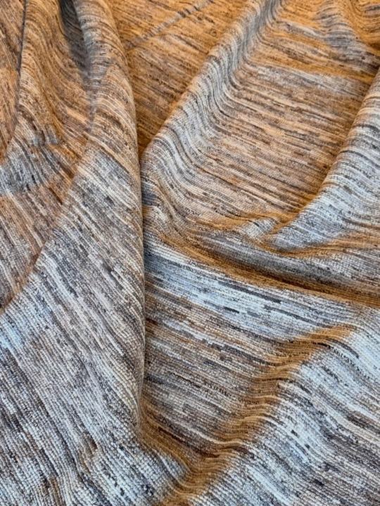 Natural undyed wool textured rug features the authentic, chemical-free color and organic feel of raw sheep’s fleece, offering a soft, earthy aesthetic with rich tactile depth.
This rug showcase the natural colour of the 